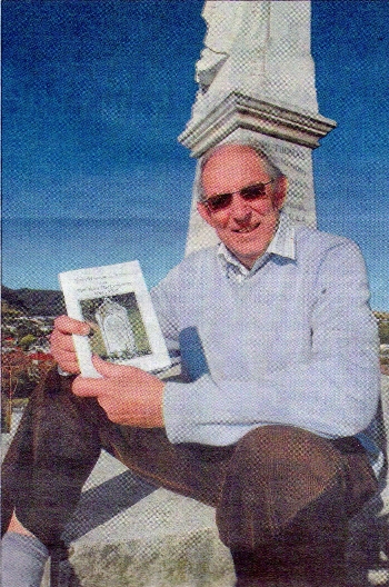 Bruce Murray with the latest booklet about Tawa Cemetery